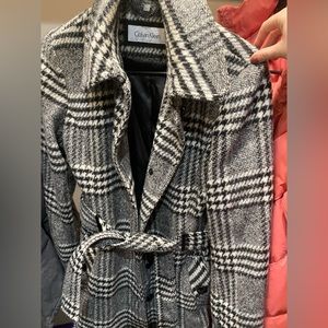 Calvin Klein XS winter coat. Black and white. Waste time and buttons. Pockets